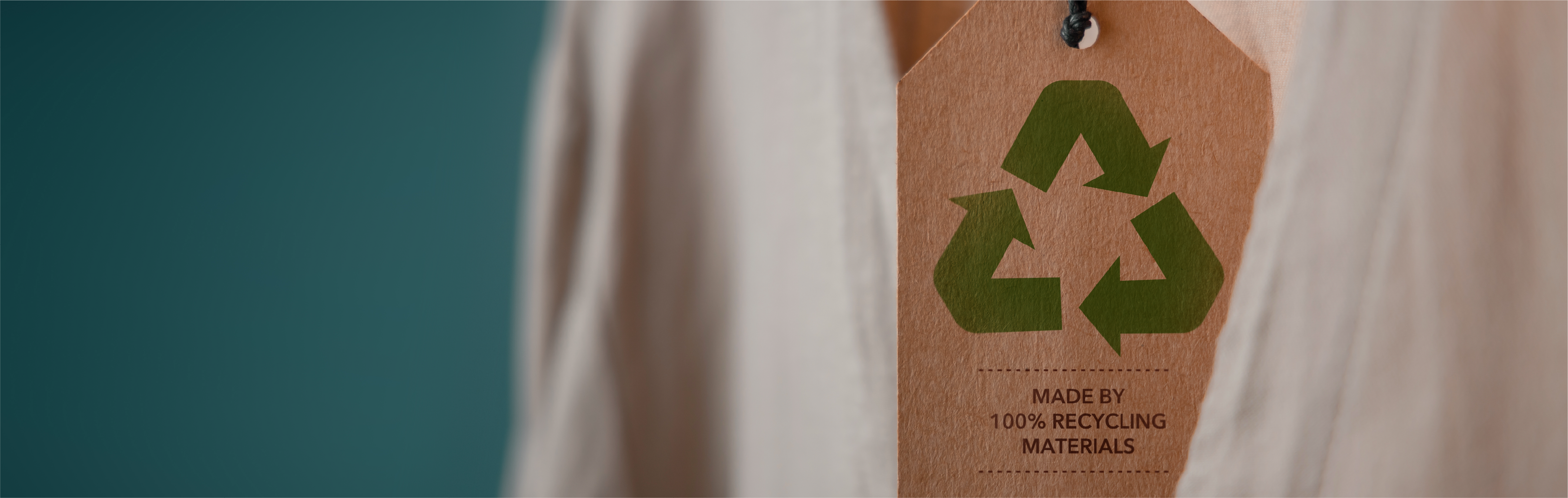 Close-up image of a fashion sustainability tag, highlighting the integration of technology in the fashion industry.